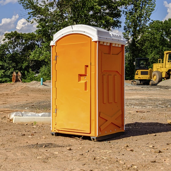 how often are the portable restrooms cleaned and serviced during a rental period in Cuyamungue Grant